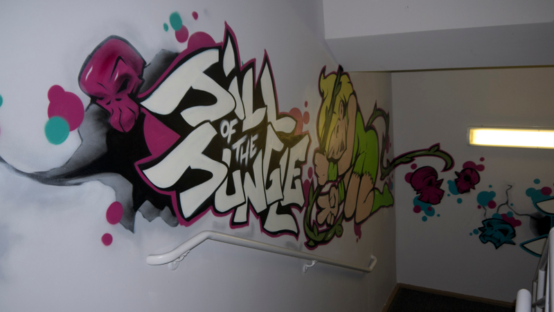 Illustration for article titled Epic Games' History Unfolds in This Graffiti-Covered Stairwell